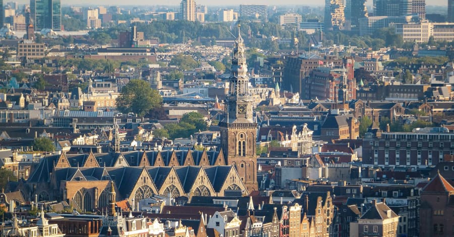 Aerial view showcasing Amsterdam's historic architecture, highlighting a stunning skyline.